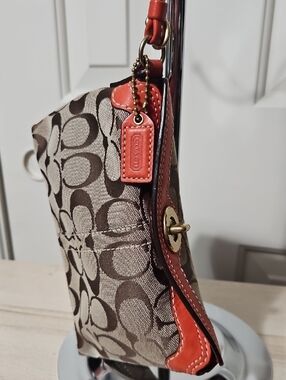 Coach EUC Turnlock Signature Canvas with Coral Trim Clutch